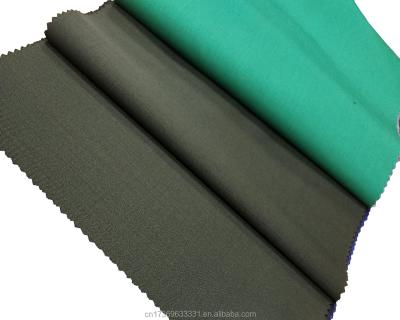 China Wool 31% Fabric 60% Wrinkle Resistant Polyester 8% T400 1% Conductive Fiber Dark Green Stock for sale