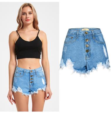 China European and American women's sustainable denim shorts with high waist yokes and holes in pure color tassel for sale