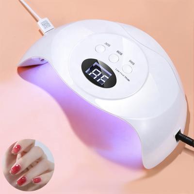 China Gel Nail Curing Professional Portable UV Led Nail Lamp 48w Faster Nail Gel Dryer Gel Curing Machine with Timer 3 Setting Auto Sensor for sale