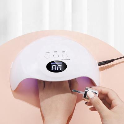 China Gel Nail Curing Hot Sale Portable UV Gel Nail Dryer Nail Lamp UV Gel Nail Curing Lamp With Auto Sensor for sale