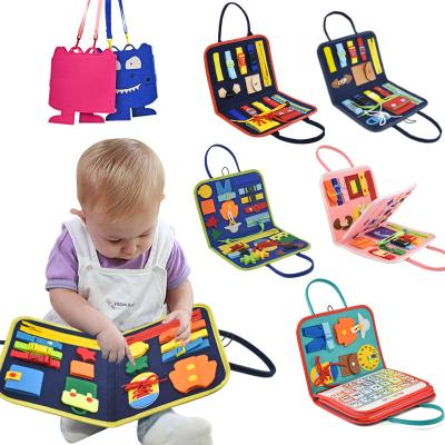 China Earlier Education Felt Busy Board For Toddlers Educational Montessori Toys juguet Busy Board Bag Design Sensory Autism Activity Board for sale