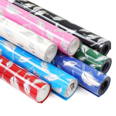 China Magical Colorful Apparel Rolls 10inx5Feet PU Sheet Feature Patterned Holographic Iron On HTV Heat Transfer Vinyl for sale