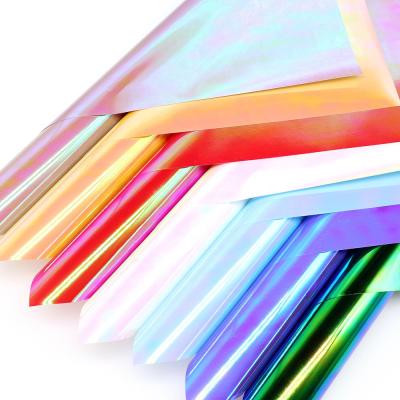 China Iridescent Progressive Apparel PET Hologram Prints Heat Press Film Iron-on Transfer HTV Heat Transfer Vinyl Sheets For Clothes Bag for sale