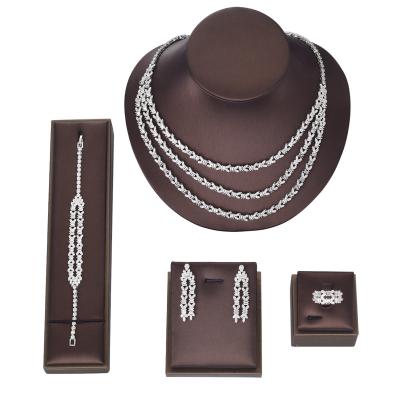 China FASHIONABLE Custom Wedding Jewelry Set Three Layer Palm Leaf Shape Luxury Zircon Jewelry Set Four Piece Set for sale