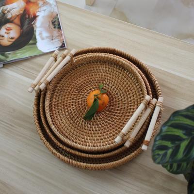 China Disposable Rattan Raw Color Round Shape Section Food Tray Wood Rattan Round Trays With Lid Dishes And Dishes Rice Dish Customized Pattern for sale