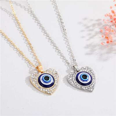 China Custom Fashion Crystal Diamond Heart Eye Necklace Gold Jewelry Pendant Necklace For Women for sale