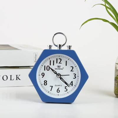 China Traditional Creative Custom Geometric Clock Face Shape Desk Clock Desk Decoration With Hook for sale