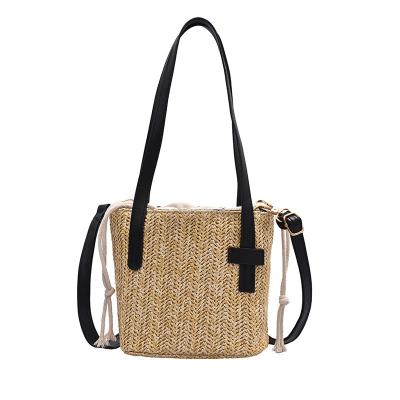 China Luxury Fashion Wheat Straw Bucket Cross - Body Tote Bag Woman Cotton Canvas Drawstring Beach Handbag Custom Logo Shoulder Bag for sale