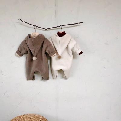 China New Baby Romper Big Pocket Casual Cute Creative Fur Hooded Winter Romper Thickened Baby Rompers for sale