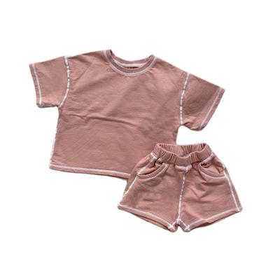 China Two-piece set summer children's clothing suit solid color soft cotton sportswear boys and girls summer clothing smart casual cool children's clothing for sale