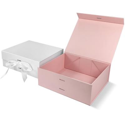 China Recyclable Custom Pink White Graduation Gift Box Packaging Foldable Magnetic Gift Box Luxury Gift Box With Ribbon Bow for sale