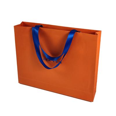 China Reused Materials Promotion Jewelry Gift Bags With Ribbon Brand Logo Design Luxury Clothing Retail Custom Printed Gift Shopping Jewelry Bag for sale