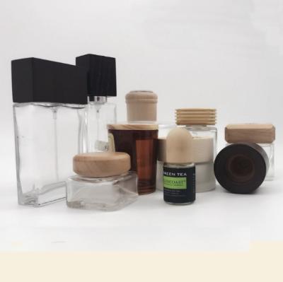 China Non Refillable Hot Sale Factory Custom Design Wooden Caps Covers For Perfume Bottles for sale