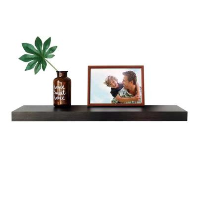 China Modern Minimalist Solid Wood Wall Hanging Black Log Kitchen Shelf TV Wall Display Rack Storage Divider for sale