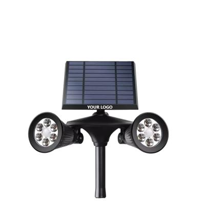 China 201 Acero inoxidable plástico doble cabeza lámparas solares sensor de movimiento exterior iluminación en venta