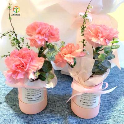 China Recycled Materials Paper Round Flower Box Cardboard Flower Box For Flower Packaging for sale