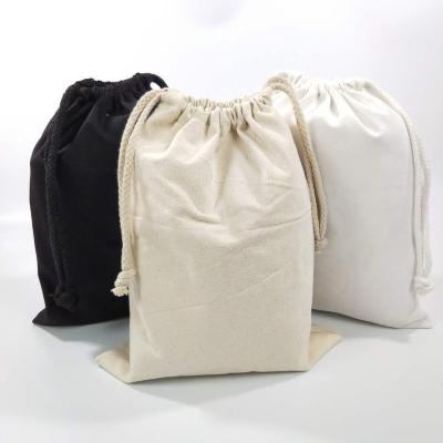 China 100% Eco-friendly/lightweight/cheap custom logo three kinds of color cotton muslin pouch simple plain canvas bag cosmetic drawstring bag for sale