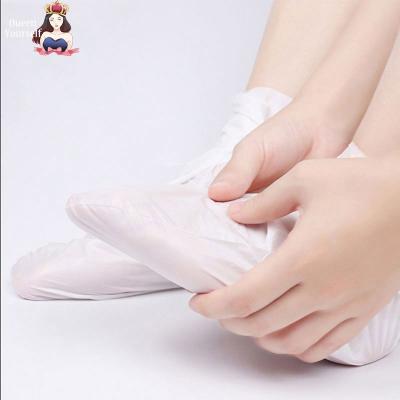 China Foot Skin Mask Vitamins Feet Peeling Mask 2 Pack Foot Peeling Mask Exfoliating Foot Skin Spa Mask For Baby Soft Skin for sale