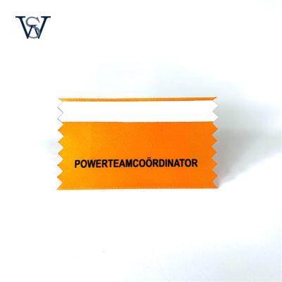 China Sustainable Orange Black Foiedprinted Satin Label With Double Side Adhesive Tape for sale