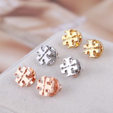 China CLASSIC Trendy Classic Design Letter Metal Earrings Women Ear Studs for sale