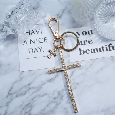 China Hot Selling Fashionable Wholesale Crucifix Key Chain Design Customized Cross Key Chains For Women Girls for sale