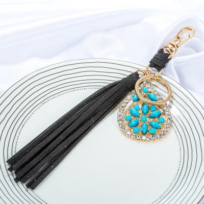 China Geometry Trendy Shape Turquoise Key Chaining Filigree Cut Color Faceted Stones Faux Suede Leather Tassel Key Chain For Women Jewelry for sale