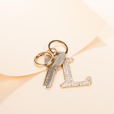 China Wholesale Fashion Jewelry Inspiration Letter Key Chaining Words Shape With Crystal CZ Pave Stone Key Chain Jewelry for sale