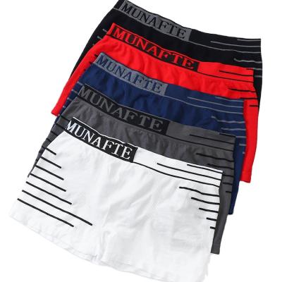 China YCH MUNA Antibacterial Seamless Men's Briefs English Alphabet With Shorts Japanese Men's Mid-Rise Underwear for sale