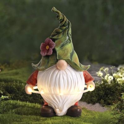 China Europe Resin Gnome Figurine Playing Circle With Solar LED Lights for sale