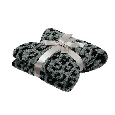 China Hot Sale High Quality Polyester Leopard Print Monogram Knitted Fleece Fabric Blanket for sale