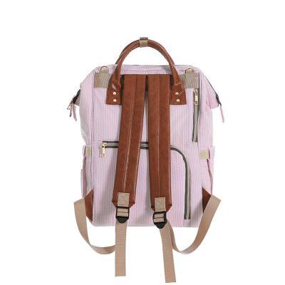 China Multifuntion Mom Backpack Bags High Quality Multifunctional Luxury Cotton Seersucker Diaper Bag Pink Backpack for sale