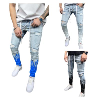 China Waterproof Custom Printing Slim Jeans Feet Hole In Flame Jogging Pants Style Ripped Jeans For Men for sale