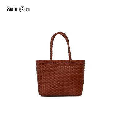 China Other Woman Handcrafted Woven Leather Handbag Tote Bag New Arrivals Braided Bags for sale