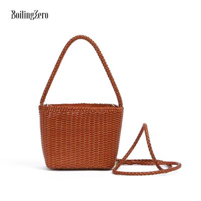 China Other Handmade Woven Leather Mini Bags 2022 Handbag Woman Crochet Shoulder Bags Cowhide Bag for sale