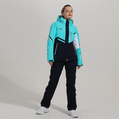 China Waterproof Windproof Women Breathable Ski Jacket Pants Winter Warm Women Snow Skiing Suits for sale