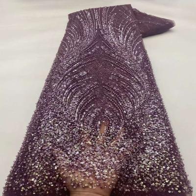 China Latest Hot Viable Luxury Sequin Embroidery Lace Fabric Luxury Lady Style Wedding Lady Style Beaded Fabric for sale