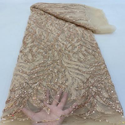 China Viable Luxury French Sequin Lace Handmade Embroidery Pearl Wedding Dress High Quality Fabric for sale