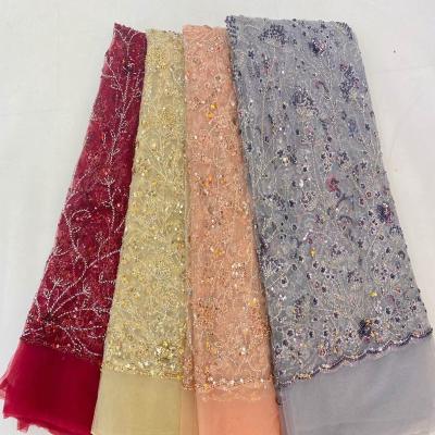 China Sustainable African French Sequins Beaded Bridal Lace For Wedding Dresses Garment Fabrics for sale