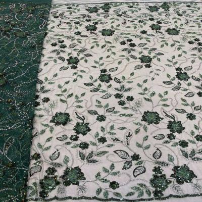 China Sustainable Materials White And Black African Green Green Order Lace Fabric for sale