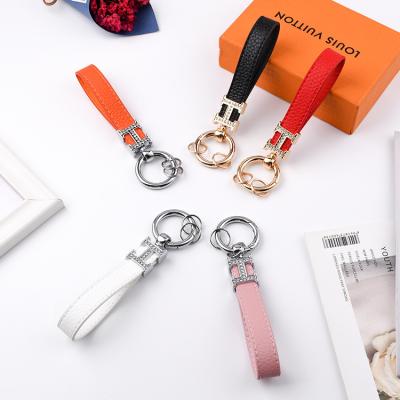 China 2022 Designer Car Bag Key Chain Pendant Luxury Keychains Leather Comfortable Girly Pink Cute Bowknot Key Chain Strap for sale