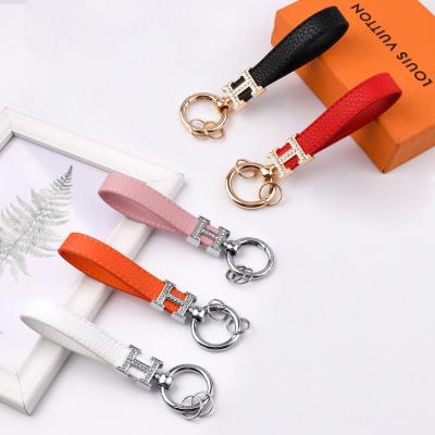 China Luxury Designer 2022 Designer Leather Car Key Strap Comfortable High Quality Chain Bag Dangling Keychain for sale