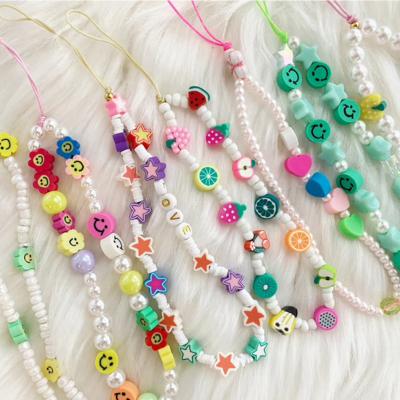 China HOT Fashion Custom Cell Phone Strap Jewelry Beaded Cell Phone Chain Colorful Cute Smile Face Fruit Beaded Pearl Cell Phone Strap For Phone Accessories for sale