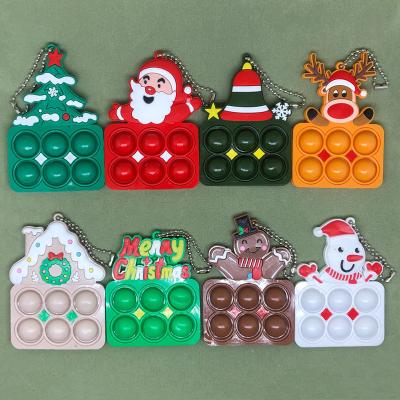 China Silicone Christmas Tree Finger Toys Key Chain Pendant Key Chain New Arrival Stress Reliever Christmas Key Ring Decor Crutch Educational Busty Person for sale