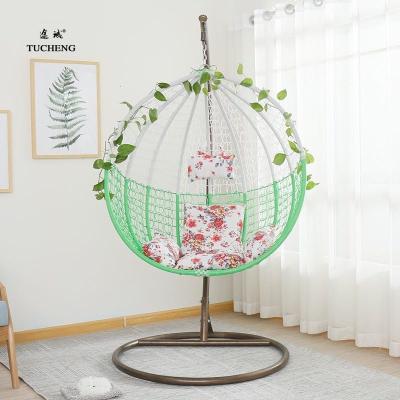 China Modern Outdoor Rattan Double Seat Wicker Egg Swing Hanging Chair With Metal Stand for sale