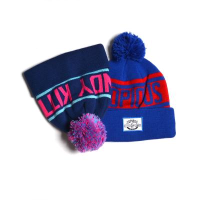 China Custom Jacquard Knitted Adult Beanie Hats Pom Pom Winter Hats COMMON COMMON for sale