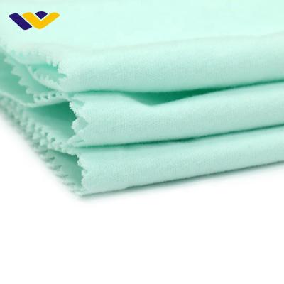 China Antistatic Cotton Fabrics Wholesale Textile Single Jersey Plain Knit Fabric For Dresses for sale