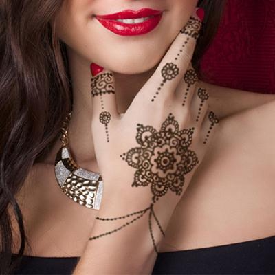 China Fashion henna mehndi temporary tattoo stickers body art face arabic hand tattoos waterproof sticker for sale