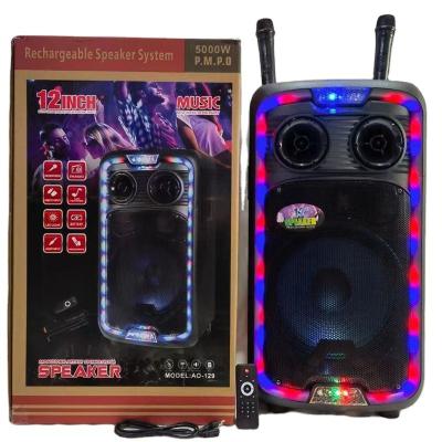 China New 12 inch flashing light LED crown speaker outdoor karaoke led speaker ao-129 wireless microphone with cart for sale