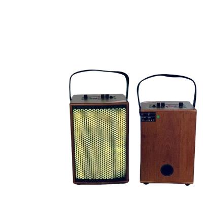 China Video Appeal 6.5 Inch Portable Outdoor Wireless Wooden Handle Speaker Has A Variety Of Color Light Effects for sale