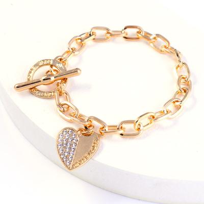 China Fashion New Charm Environmentally Friendly Jewelry Gold Chain Toggle Hugging Bracelet Rhinestone Heart Bracelet For Women for sale